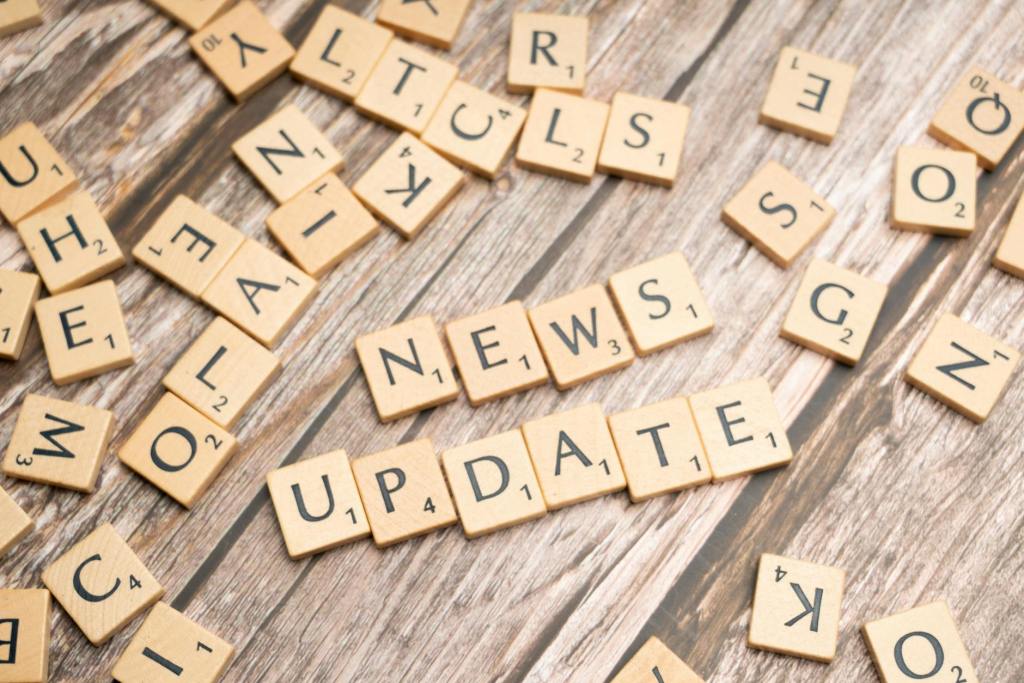 scrabble tiles with the words news update